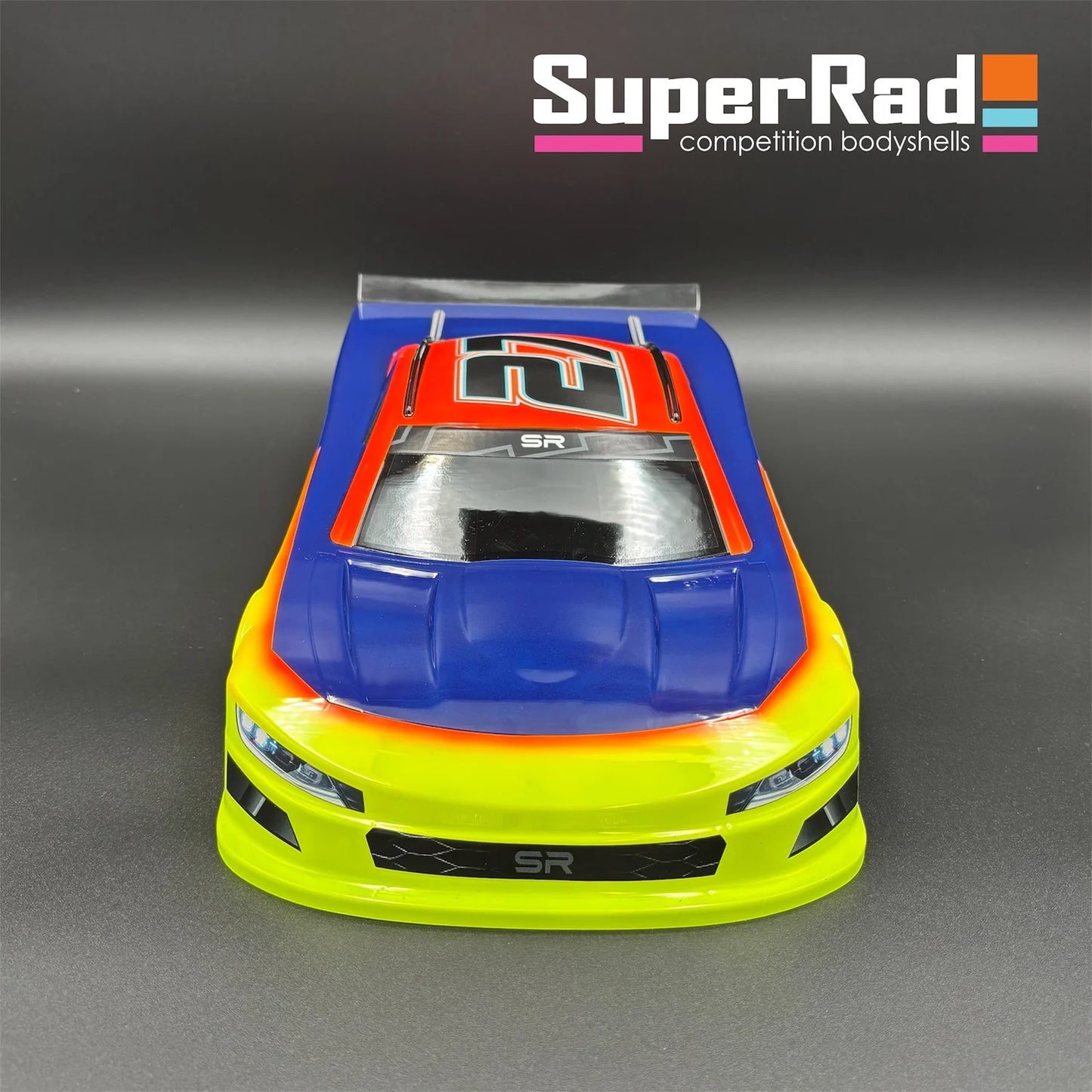 The SR-27 SuperMero 1/10th oval car body is designed for stock class racing.  Includes decal sheet, and window masks. TOUR approved. Made in USA.