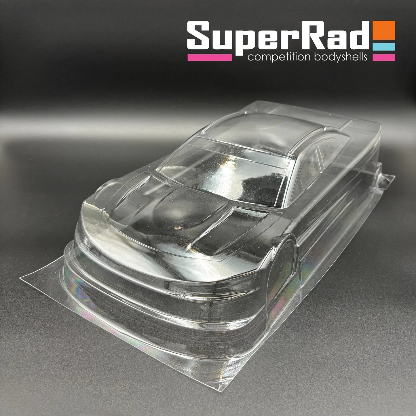 The SR-27 SuperMero 1/10th oval car body is designed for stock class racing.  Includes decal sheet, and window masks. TOUR approved. Made in USA.